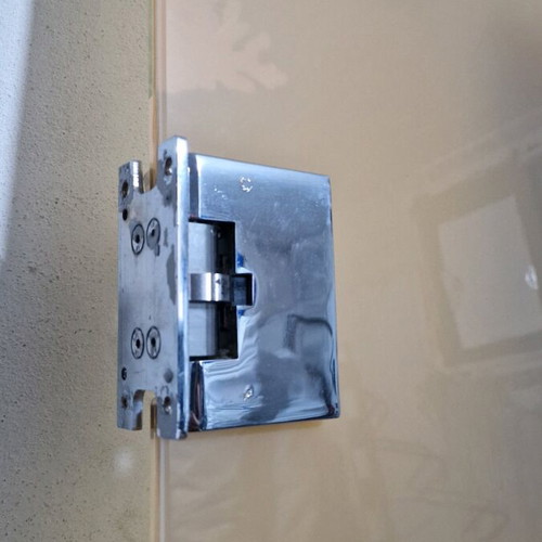 Glass door used with metal hinges and glass knob