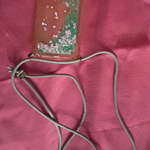 iPhone X/XS phone case used with lanyard and glitter