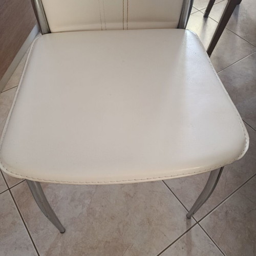 Set of 4 beige dining chairs with leatherette upholstery