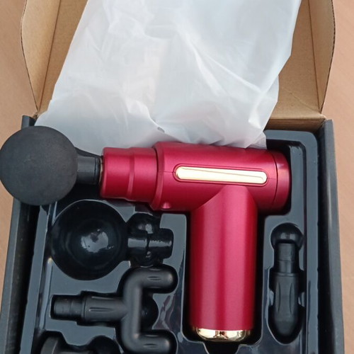 Massage gun new with four attachments and six speeds