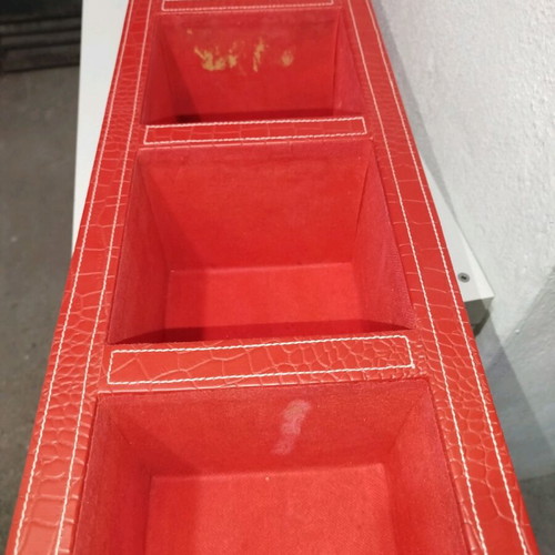 Shelf with red leather upholstery used, 5 compartments for CDs
