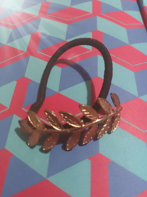 Hair elastic with gold leaf branch design