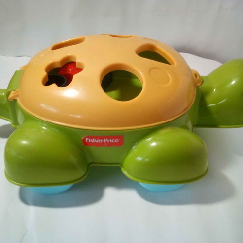 Interactive turtle toy Fisher Price used with shapes