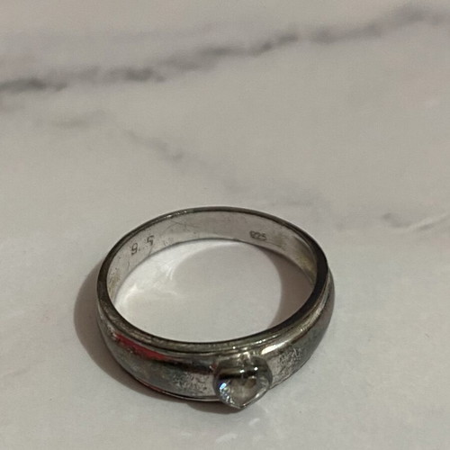 Silver ring with heart-shaped strass used