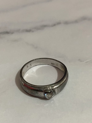 Silver ring with heart-shaped strass used