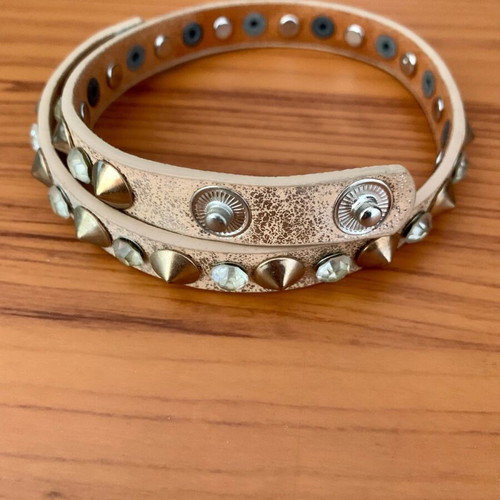 Bracelet with studs and transparent stones like new, beige and silver