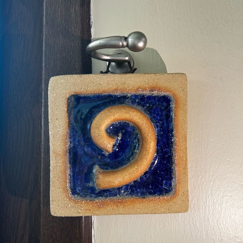 Clay wall decoration like new with glass