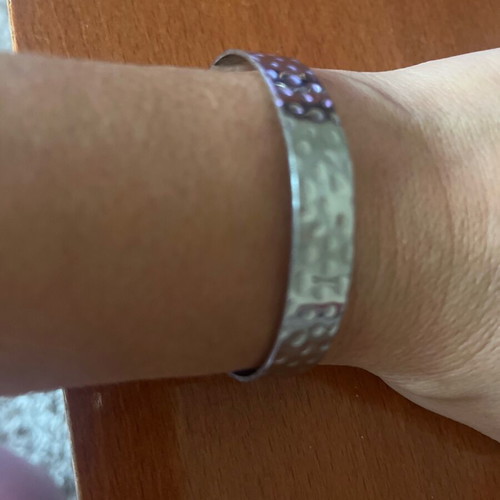 Steel bracelet like new, adjustable, silver color