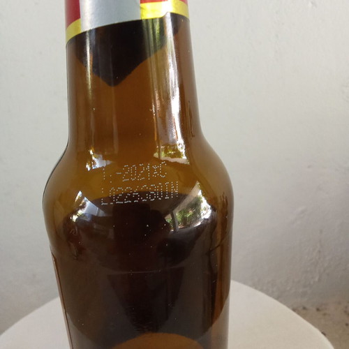 McFarland red beer bottle collectible
