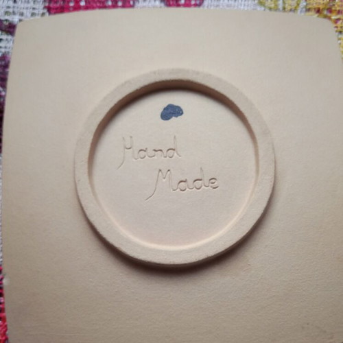 Handmade decorative plate with dolphins