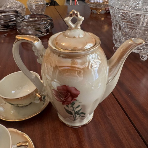Vintage porcelain tea set with flowers and gold details, like new