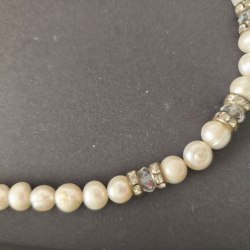 Necklace with pearls and rhinestones used