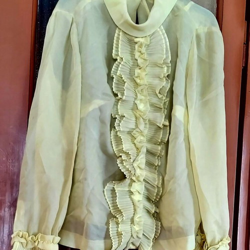 Silk shirt used in yellow color size L
