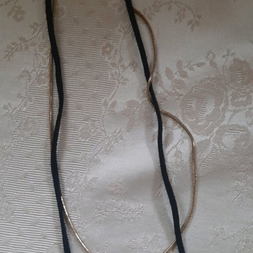 Necklace new with studs and long cord