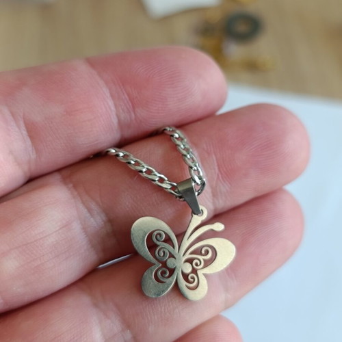 Stainless steel necklace with butterfly pendant, like new, 44 cm