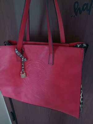 Bag red with tiger print on side like new, large capacity
