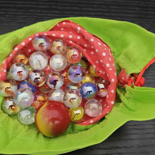 Fabric pouch with colorful glass marbles like new