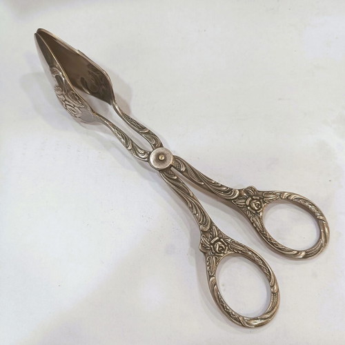 Sugar tongs used, Rococo Revival style, mid-20th century