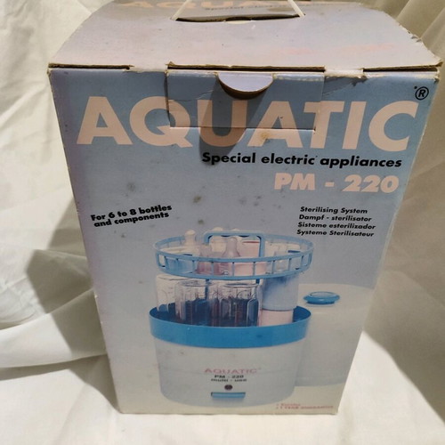 Bottle sterilizer and pacifiers new in box with all accessories