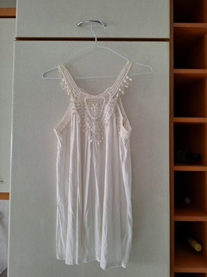 Attrattivo white sleeveless blouse used, knitted details
