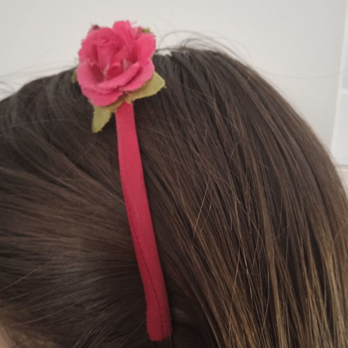 Children's tiara used with pink and green roses