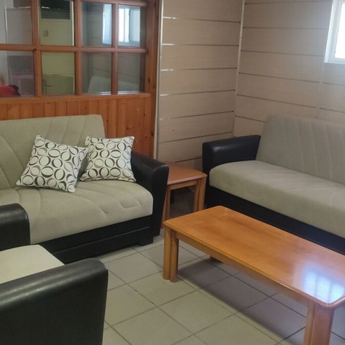 Living room set 6 pieces leather and fabric like new with storage and sofa bed