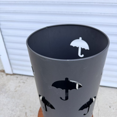 Metal Umbrella Stand used, black with umbrella cutout design