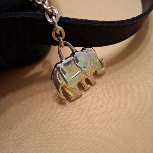 Shoulder bag black genuine leather like new with elephant detail