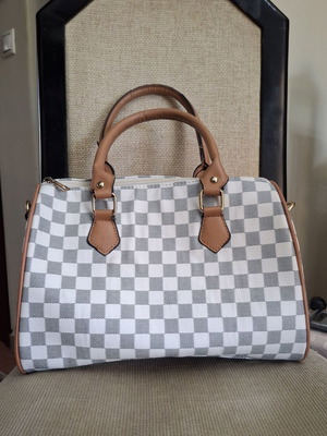 Handbag barrel style with white and grey checkered pattern