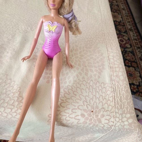 Barbie doll used