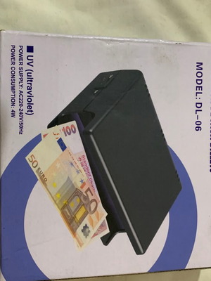 Counterfeit detector like new