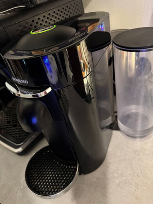 Nespresso Vertuo Plus by Delonghi coffee machine used, black