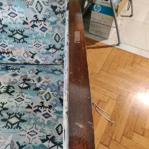 Armchair used made of good wood with fabric cover