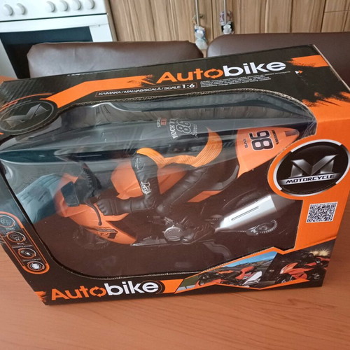 Toy motorcycle vehicle with rider, sounds, lights, and bump & go function new