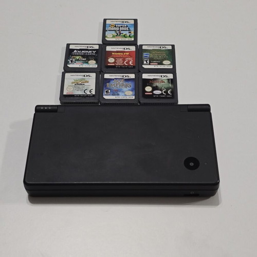 Nintendo DSi black console pack used with 7 games, charger and travel case