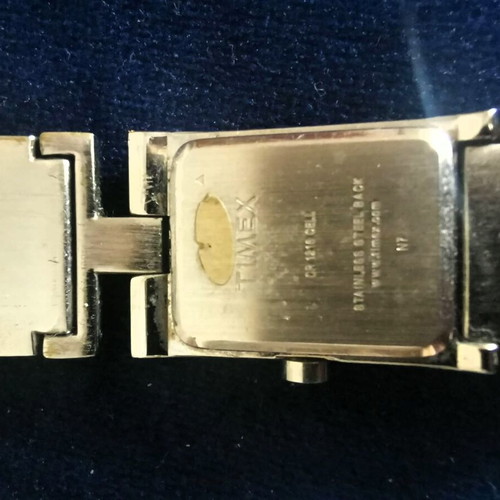 Timex women's quartz watch with used silver metal bracelet