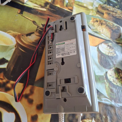 Intercom with battery compartment like new, white, corded