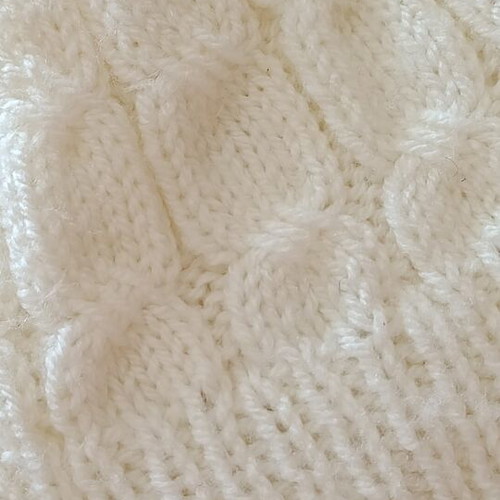 Children's knitted hat with pom pom, like new, white
