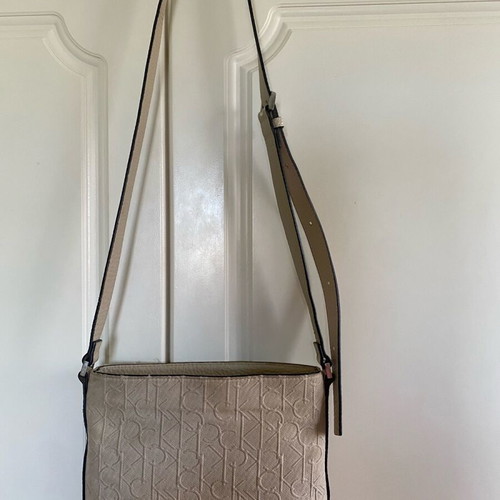 Calvin Klein crossbody bag used, beige with embossed logo