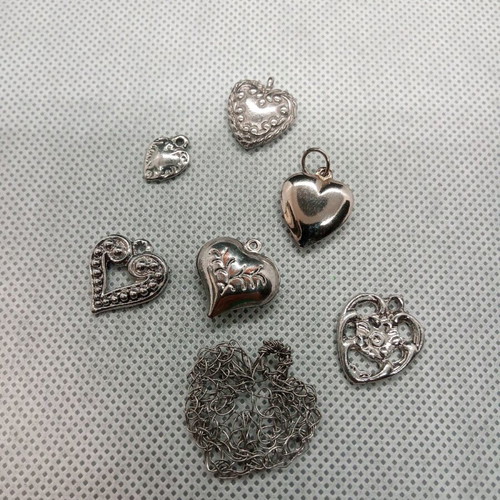 Metal heart-shaped elements like new, pack of seven for crafts