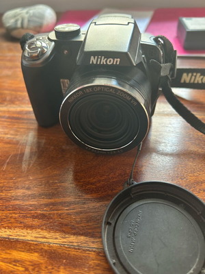 Nikon Coolpix P80 camera with case and charger