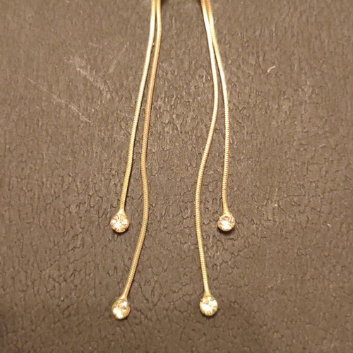 Dangling earrings used, silver tone with double thin chains and clear rhinestones