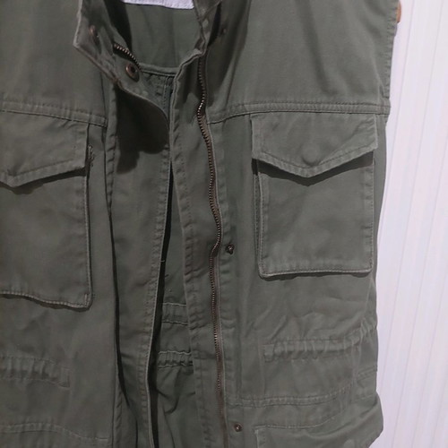 Khaki sleeveless jacket used, size M