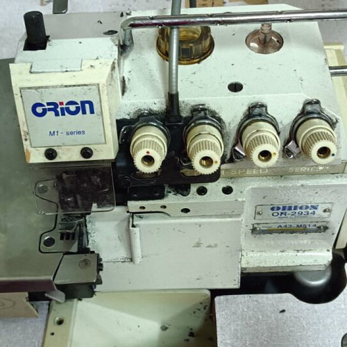 Four-thread overlock sewing machine with cutter used