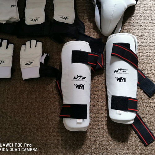 Tae Kwon do equipment used with medium chest protector and small accessories