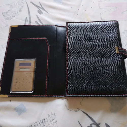 Agenda with solar calculator and notebook like new