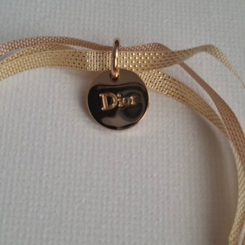 Dior bracelet with charm and adjustable ribbon new, gold and beige