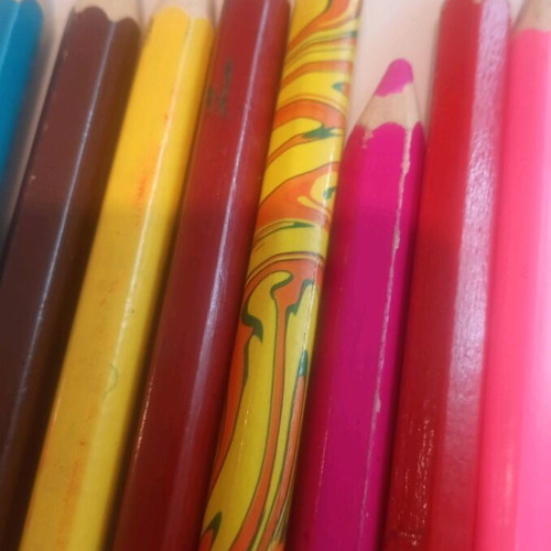 Set of colored thick pencils used