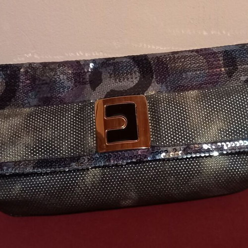 Clutch bag like new with blue and silver sequins