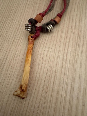 Bone necklace pendant used